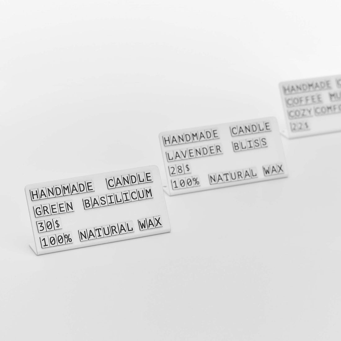 metal price tags with magnetic symbols in white, easy-to-change price tags from NOKU