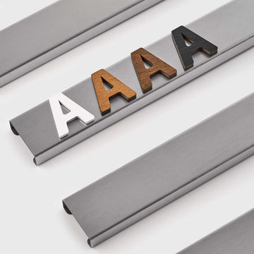 Stylish wall menu solution for specialty coffee shops: Stainless steel rails with with options for magnetic letters: acrylic white, wooden light, wooden brown and black